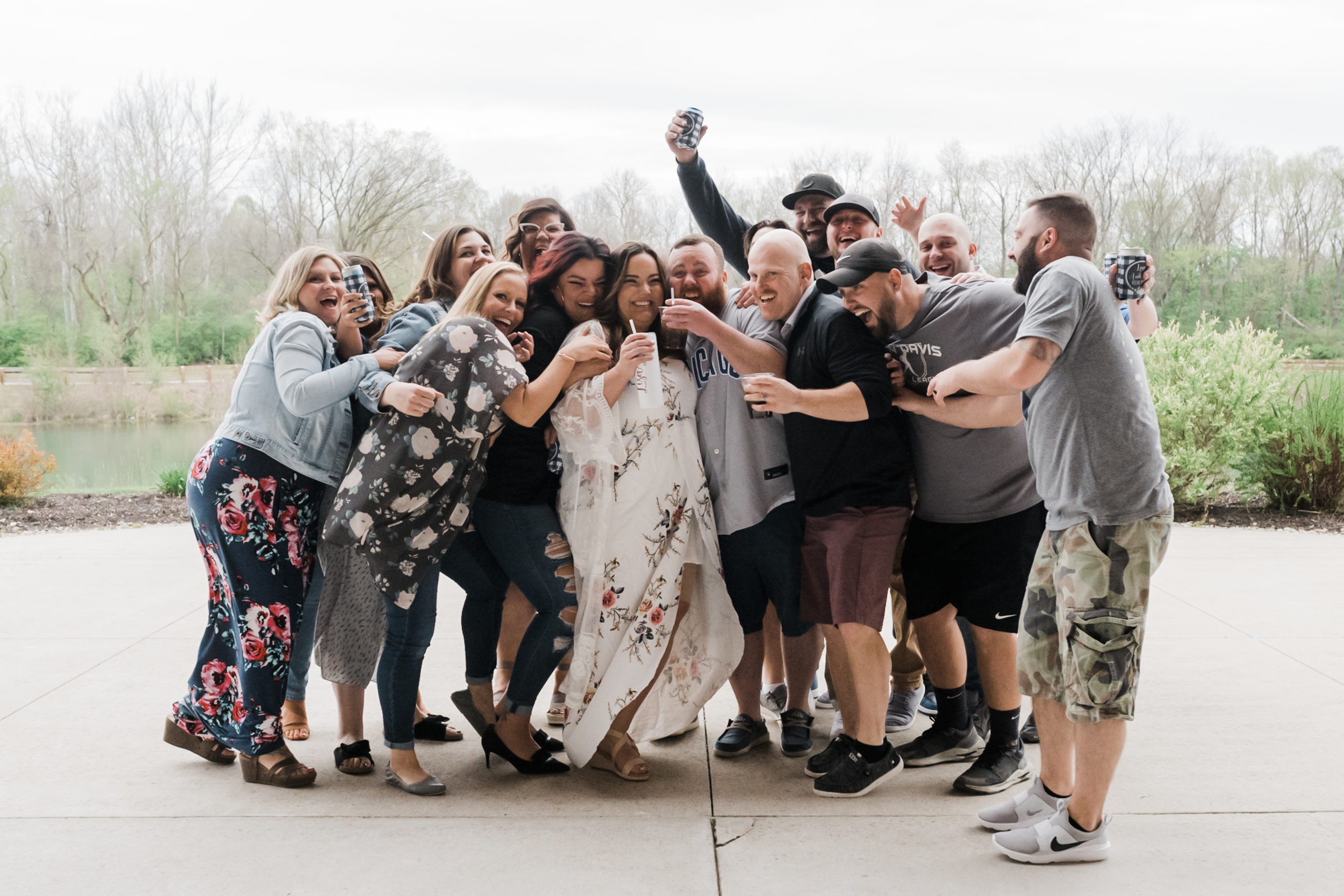 Wedding photographer captures images at rehearsal dinner.