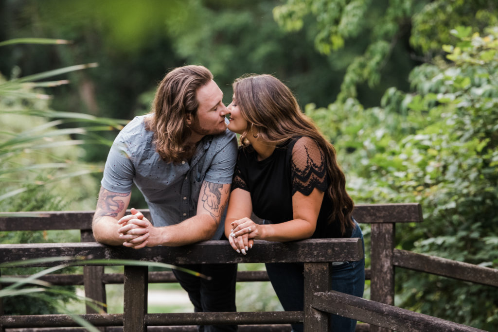 Engagement picture on the bridge at Newfields.