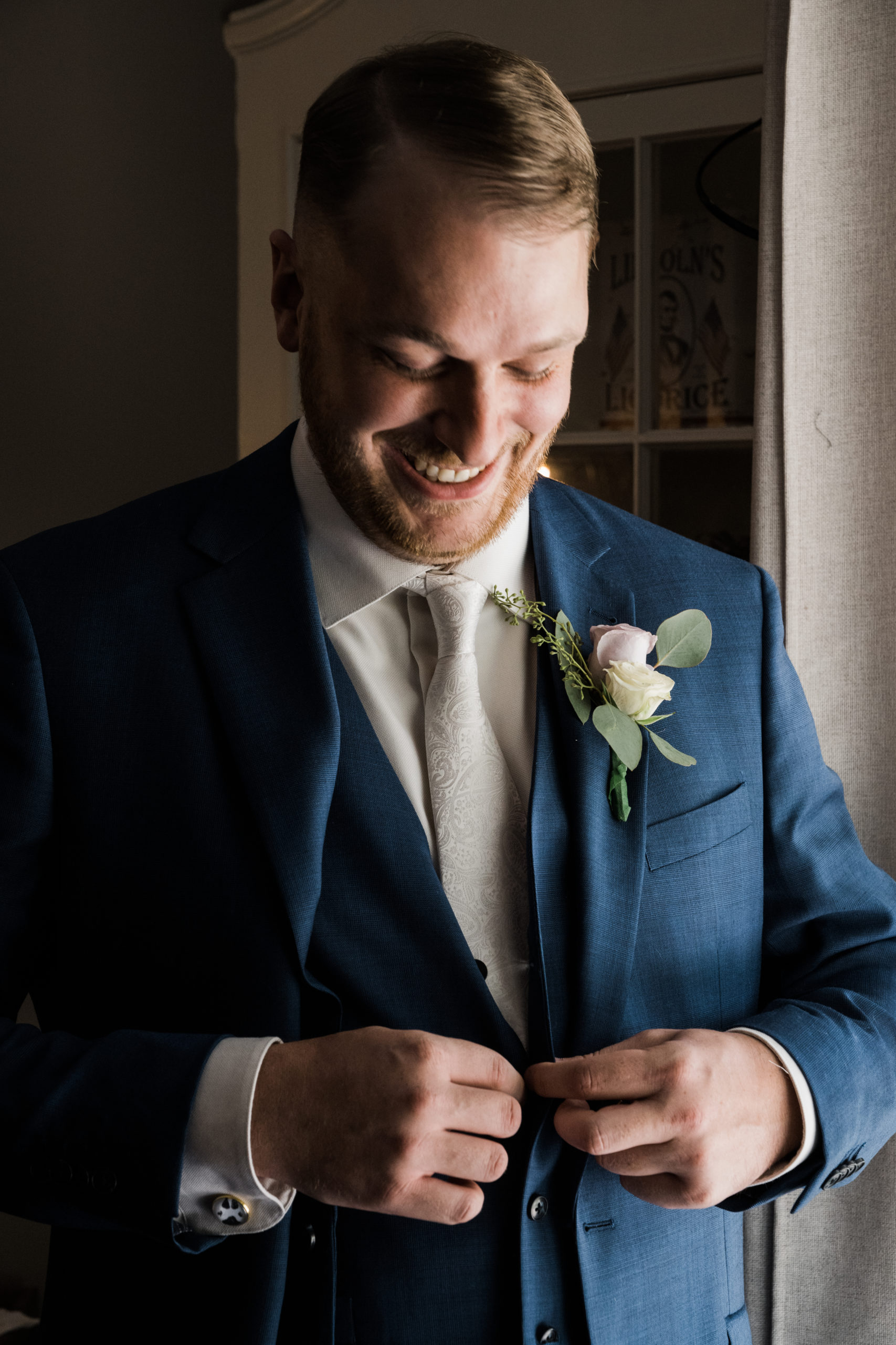 Groom getting ready Black Iris wedding Carmel, Indiana