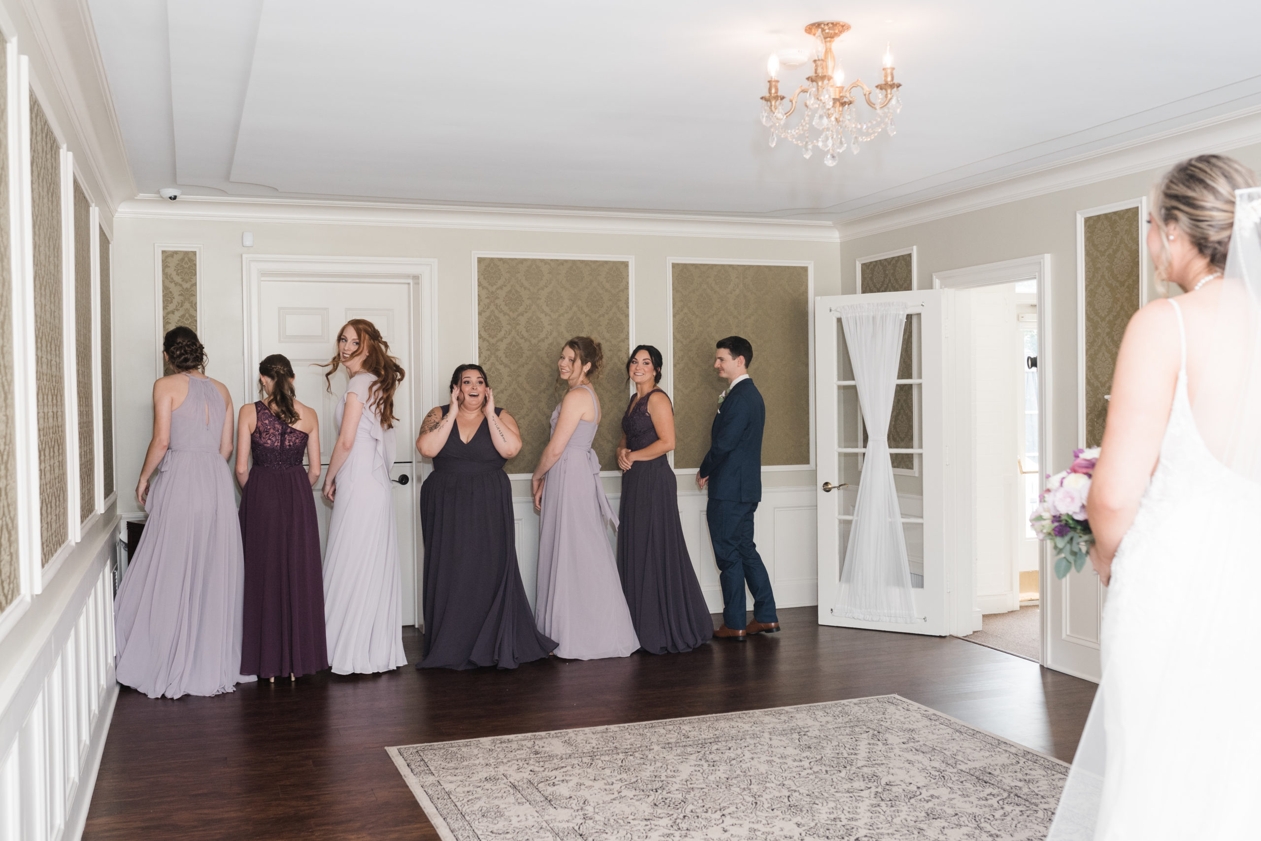 first look with wedding party Black Iris wedding Carmel, Indiana