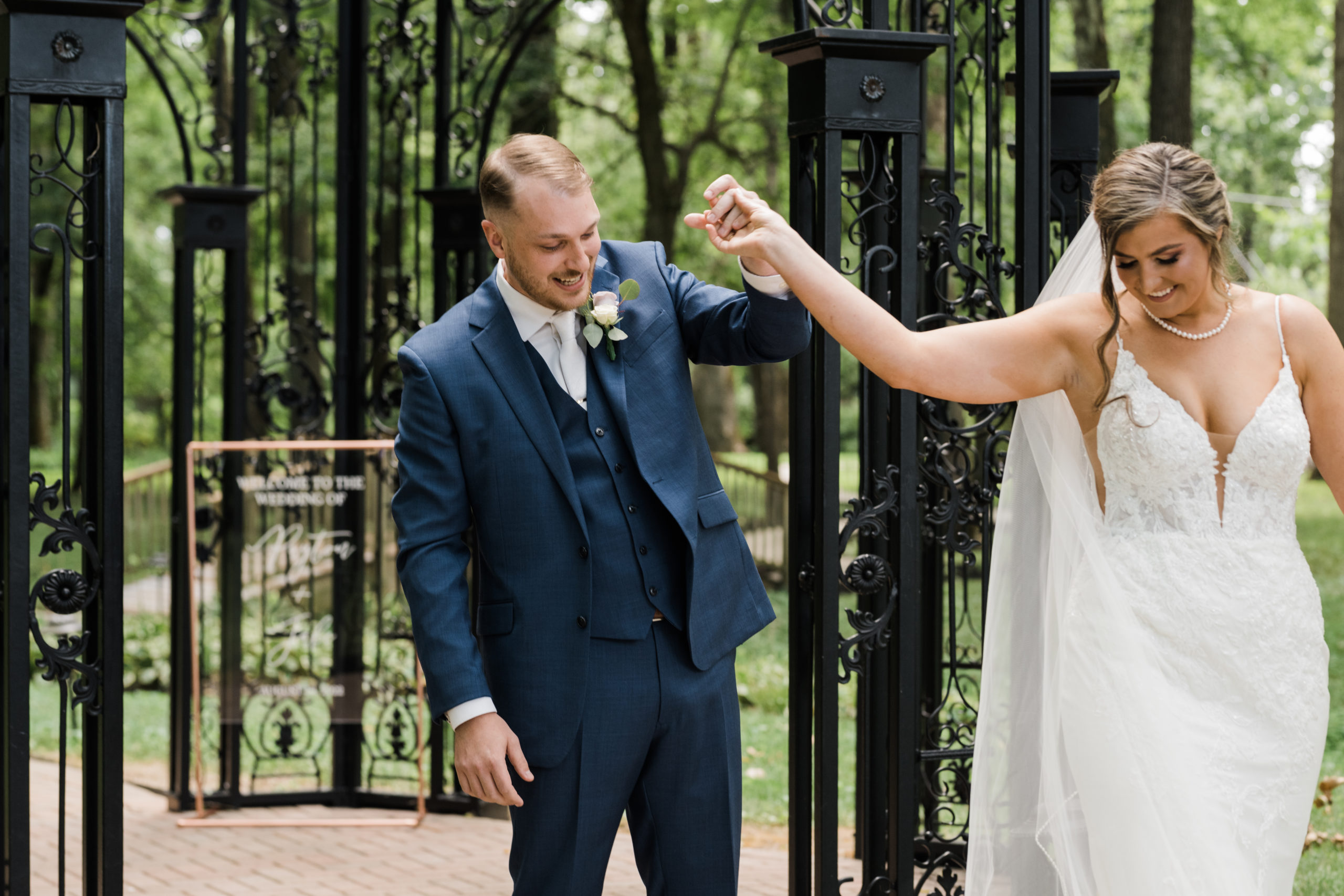 Wedding photographer captures groom's reaction first look Black Iris wedding Carmel, Indiana