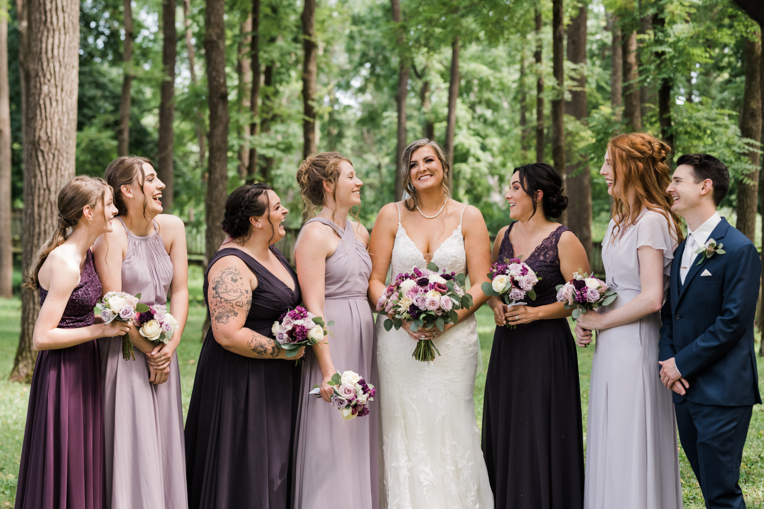 Bride with wedding party photo Black Iris wedding Carmel, Indiana