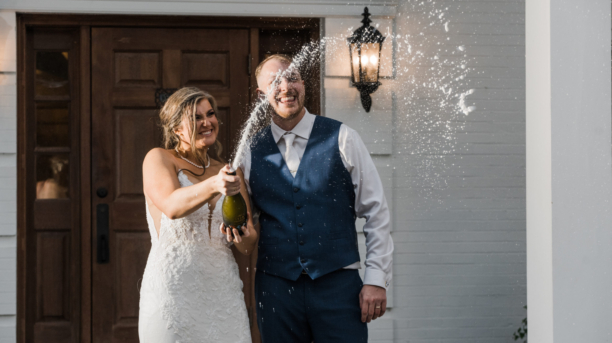 Champagne pop photo Black Iris Estate Wedding Day Carmel, Indiana