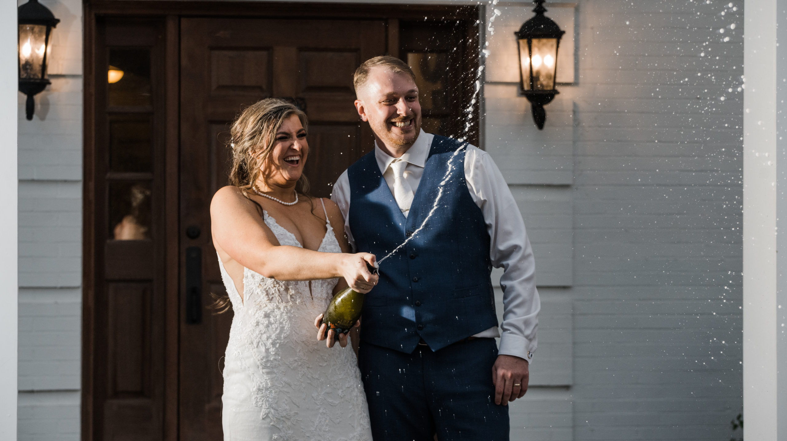 Champagne pop photo Black Iris Estate Wedding Day Carmel, Indiana