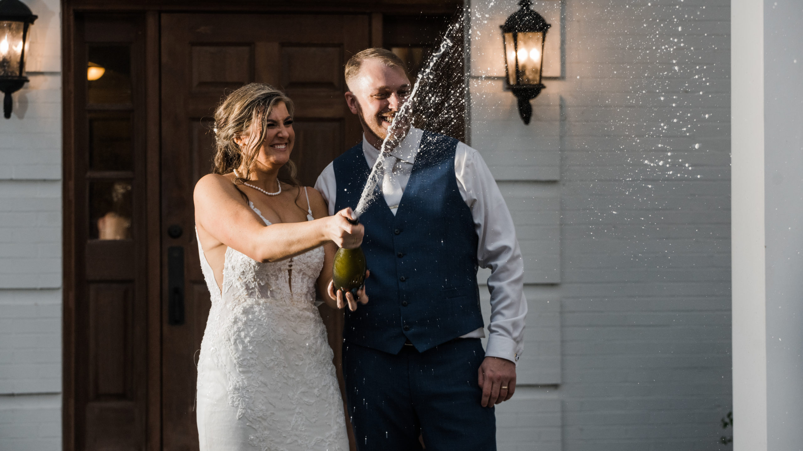 Champagne pop photo Black Iris Estate Wedding Day Carmel, Indiana