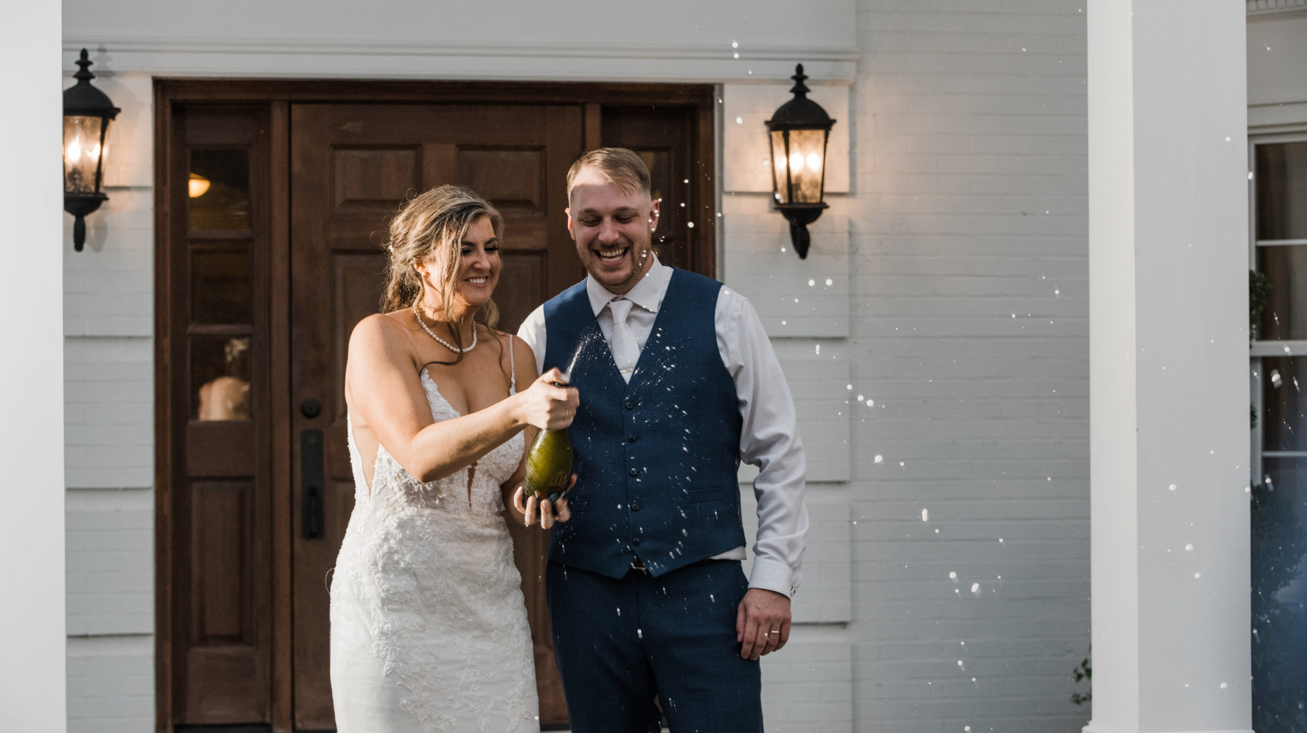 Champagne pop photo Black Iris Estate Wedding Day Carmel, Indiana